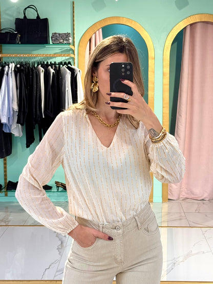 Blouse en col V beige avec détails en lurex doré